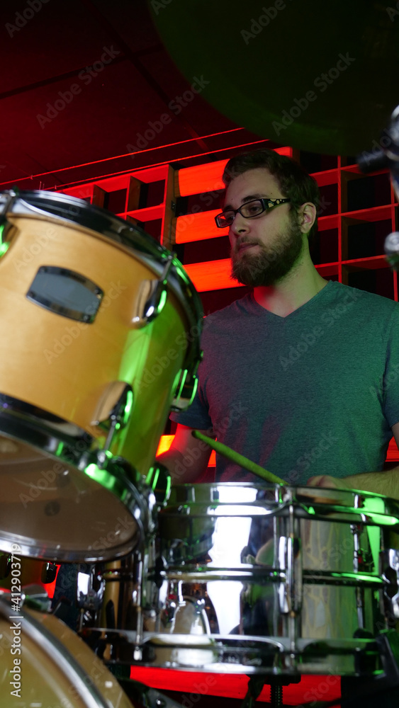 Fototapeta premium music group rehearsing, testing vocals and mastering in a professional recording studio