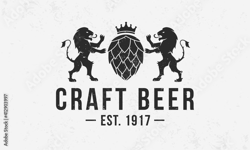Heraldic beer monogram. Vintage Craft Beer logo with hop and lions silhouettes. Beer Crest with grunge texture. Poster design for bar, pub, restaurant. Vector illustration