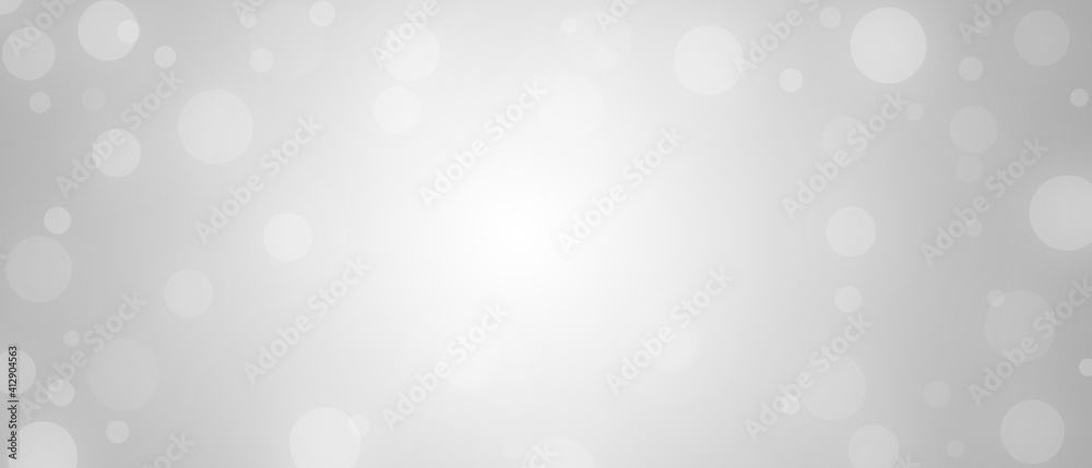 Abstract white bokeh on grey background Abstract white bokeh on grey background