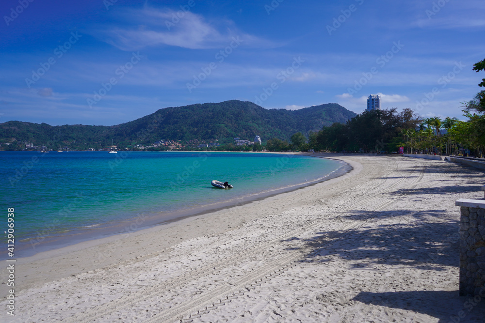Beautiful tropical beach background landscape nature day light. Patong beach in Phuket, Thailand. Phuket is a popular destination famous for its beaches. High quality photo