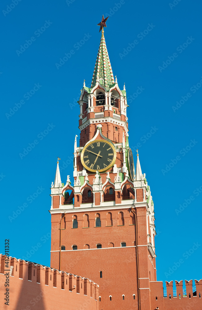 Spasskaya Tower of Moscow Kremlin. Summer morning. Red Square. Moscow. Russia Spasskaya Tower of Moscow Kremlin. Summer morning. Red Square. Moscow. Russia