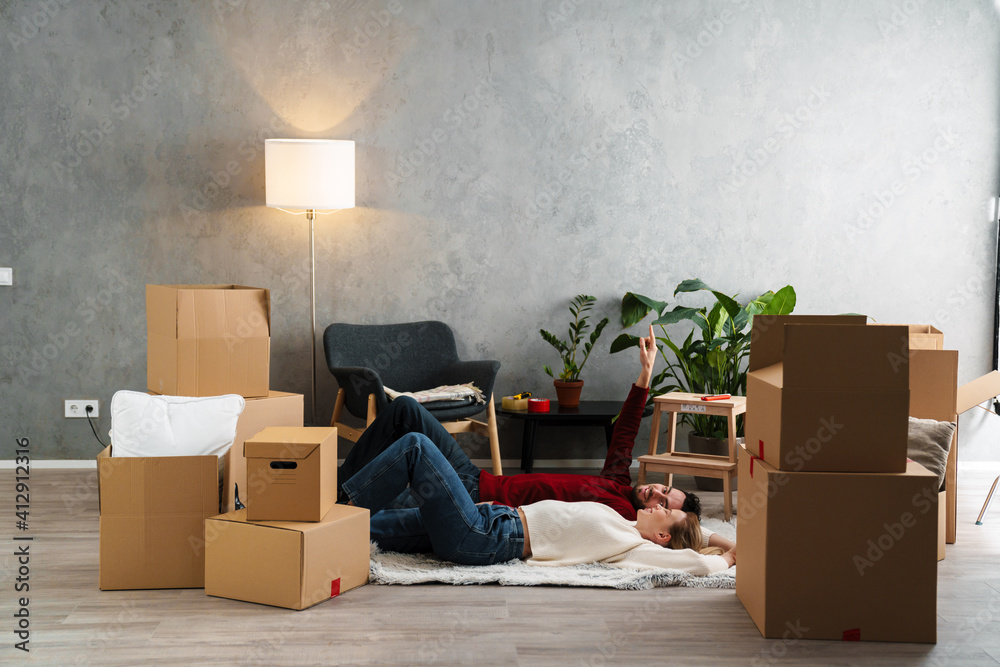 Fototapeta premium Young couple resting while moving