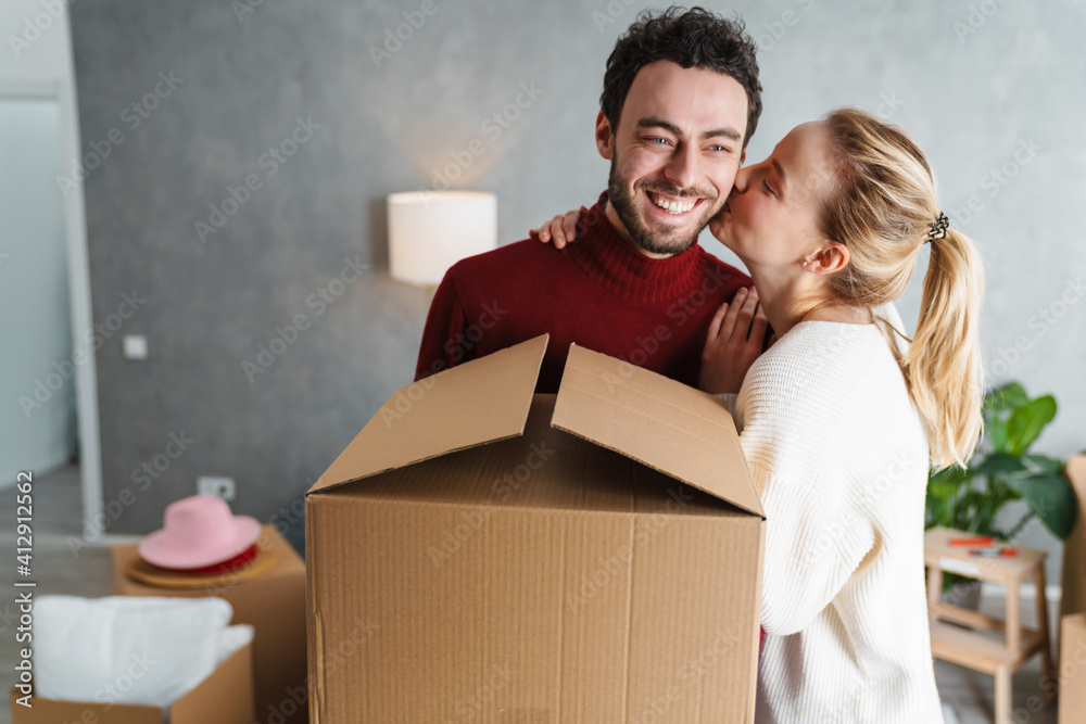 Portrait of a smiling couple moving together Portrait of a smiling couple moving together