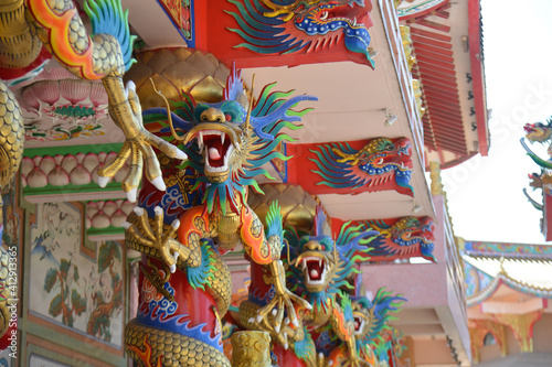 Beautiful Dragon Sculpture in Wihan Thep Sathit Phra Kitthi Chalerm Shrine (Nacha Sa Thai Chue Shrine or Naja Shrine) Bang Sean, Chonburi, Thailand photo