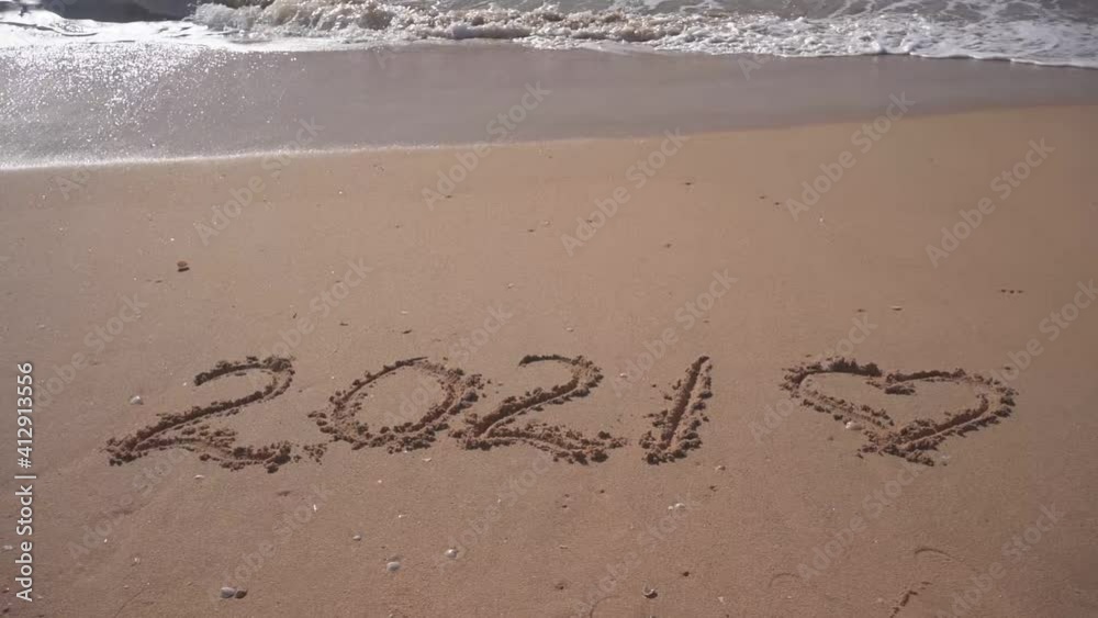 2021 year and romantic love heart sign hand written sandy beach outdoors seascape video clip 2021 year and romantic love heart sign hand written sandy beach outdoors seascape video clip