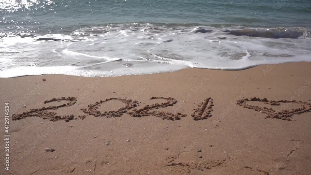 2021 year and romantic love heart sign hand written sandy beach outdoors seascape video clip 2021 year and romantic love heart sign hand written sandy beach outdoors seascape video clip
