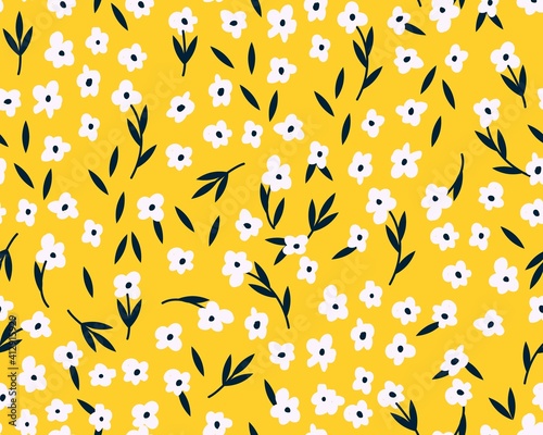 Spring seamless pattern with cute flowers. Hand drawn summer flora textile