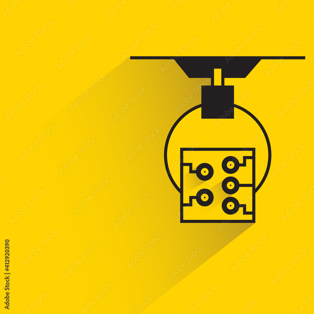 robotic arm picking microchip on yellow background robotic arm picking microchip on yellow background