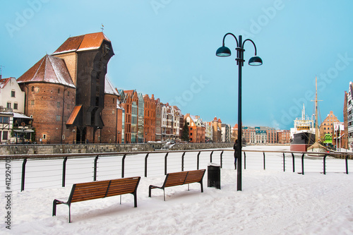 Crane and frozen river Motlawa in Gdansk, Poland