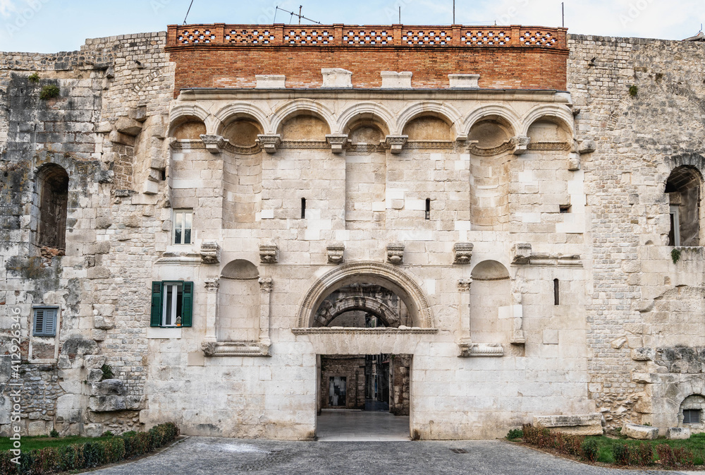 Stone facade of golden gate entrance to Diocletian Palace in Split Croatia