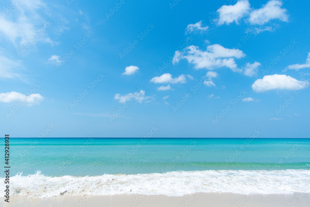 White beach sand Sea water blue Blue sky clear background White beach sand Sea water blue Blue sky clear background