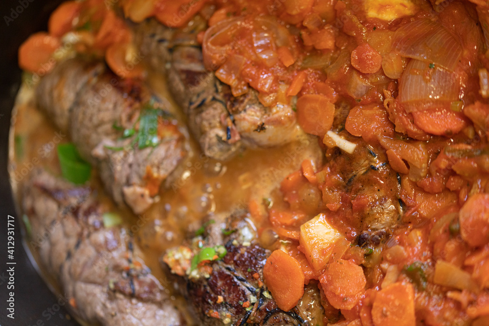 Roasted stuffed pork chop with vegetables. Roasted stuffed pork chop with vegetables.