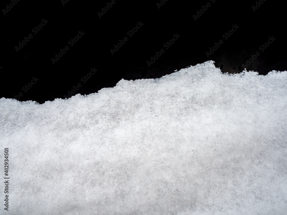 Fototapeta Snow cover on dark glass, abstract background