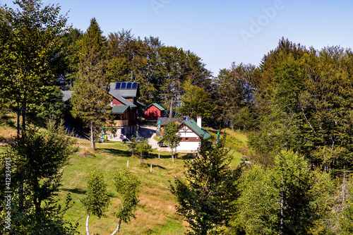 Fototapeta Naklejka Na Ścianę i Meble -  Touristic mountain hut Schronisko na Leskowcu at Gron Jana Pawla II peak in Little Beskids mountains near Andrychow in Lesser Poland
