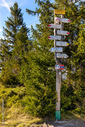 Fototapeta Naklejka Na Ścianę i Meble -  Touristic mountain path travel guide on top of Leskowiec peak in Little Beskids mountains near Andrychow in Lesser Poland