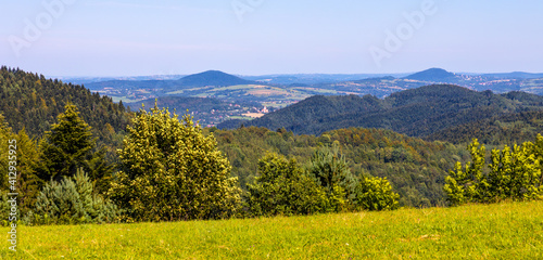 Fototapeta Naklejka Na Ścianę i Meble -  Panoramic view of south-eastern Beskidy Mountains seen from path to Leskowiec peak from Targoszow village on southern slope of Little Beskids in Lesser Poland