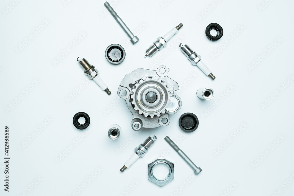 automotive parts. Set of new metal car part. Auto motor mechanic spare or automotive piece isolated on white background. Technology of mechanical gear with space for text. automotive parts. Set of new metal car part. Auto motor mechanic spare or automotive piece isolated on white background. Technology of mechanical gear with space for text.