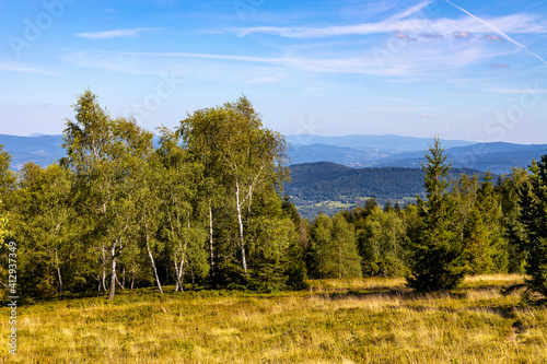 Panoramic view of grassy Leskowiec peak in Little Beskids with Babia Gora peak in southern Beskidy mountains near Andrych  w in Lesser Poland