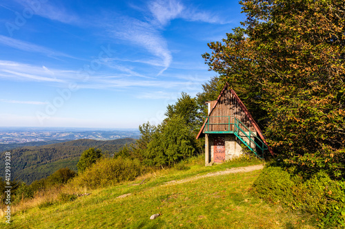 Fototapeta Naklejka Na Ścianę i Meble -  Panoramic view of eastern Beskidy mountains from Gron Jana Pawla II - John Paul II peak in Little Beskids mountains near Andrychow in Lesser Poland