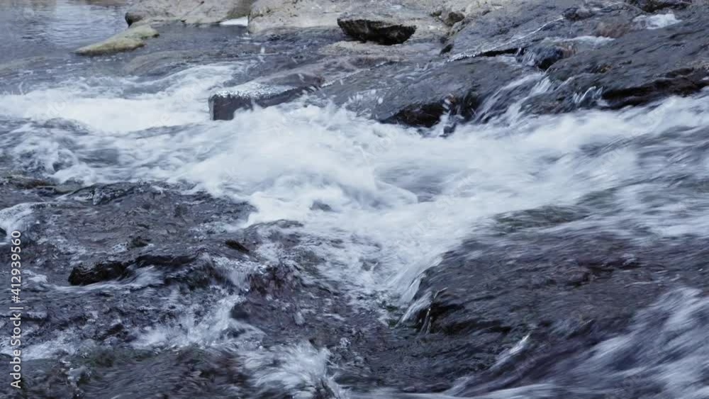 A slow motion clip of a small creek in the area of gosau in austria A slow motion clip of a small creek in the area of gosau in austria