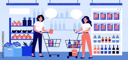 Female customers shopping in supermarket. Women talking, buying food, wheeling card. Flat vector illustration. Grocery store, female friendship concept for banner, website design or landing web page