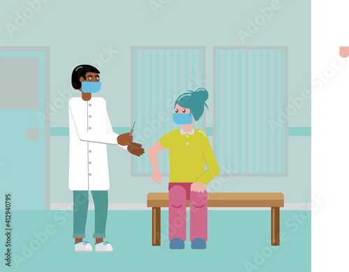 A Doctor injecting a dose of covid-19 vaccine into a person with a face mask.