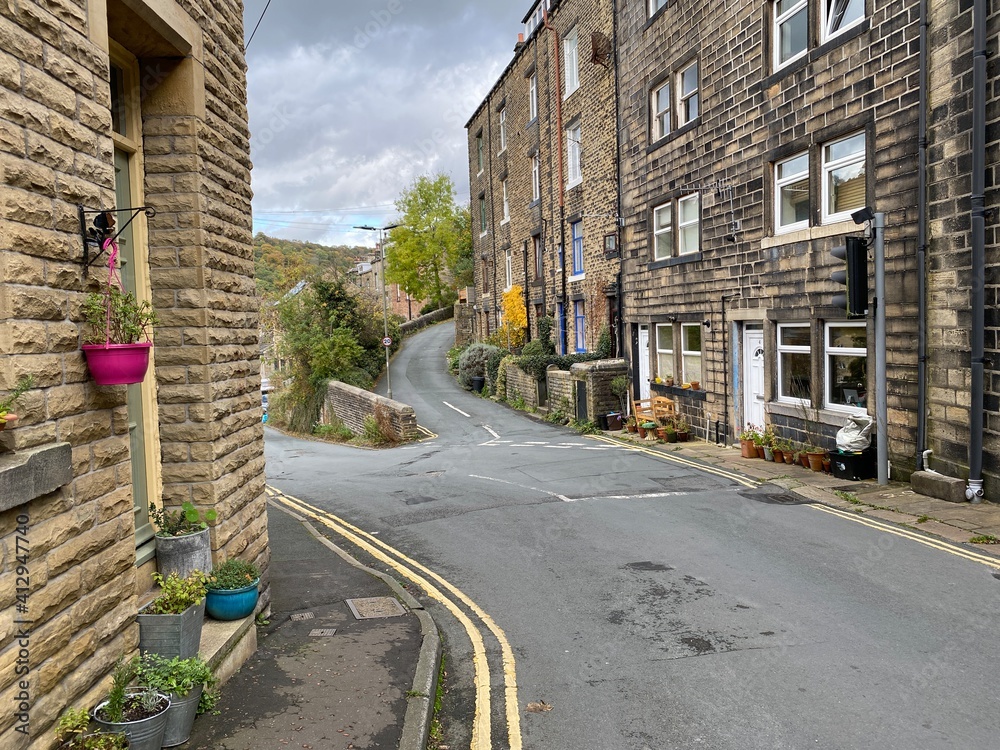 View on, Foster Lane, with Victorian houses, on a cloudy autumn day in, Hebden Bridge, Yorkshire, UK