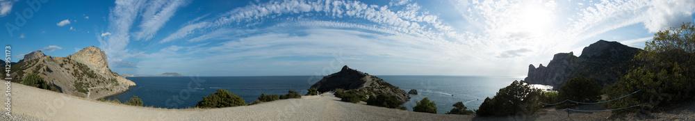 Summer Crimean landscape, juniper grove on a sunny day, Golitsyn Trail, Crimea.