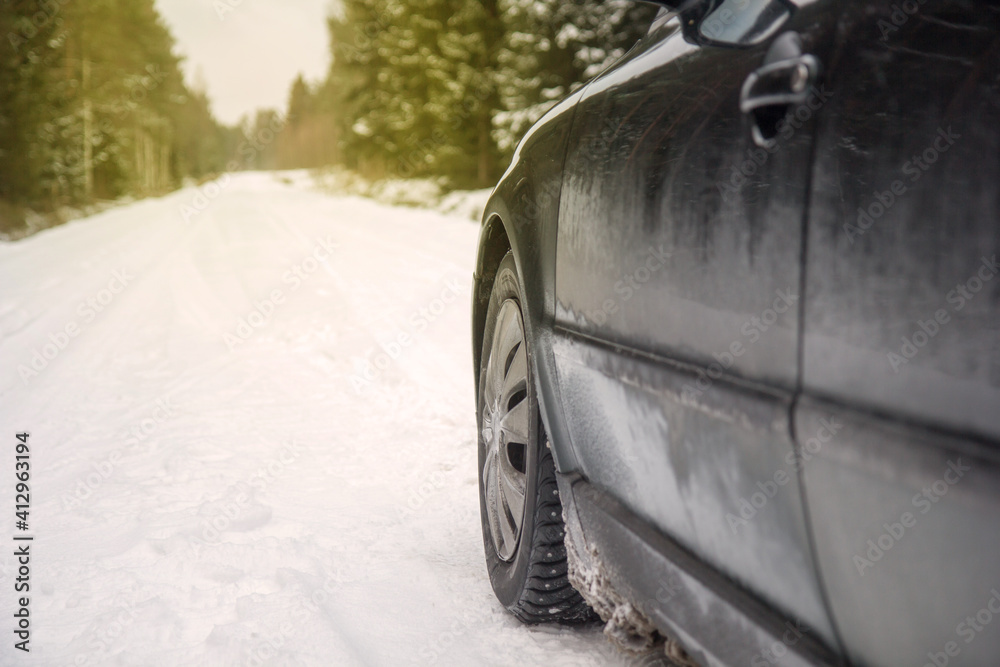 Winter Driving. Driving car through forest by small snowy road. Winter Driving. Driving car through forest by small snowy road.