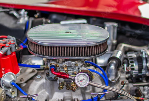 Фотография Closeup shot of a carburetor of car