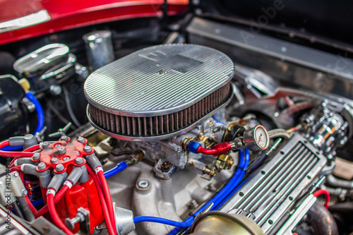 Closeup shot of a carburetor of car photo