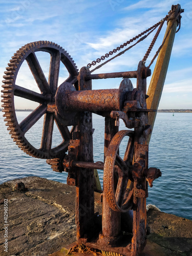 Old rusty metal dock crane