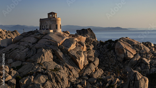 Sunset at the Capotesta Lighthouse in Sardinia photo
