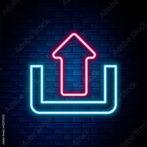 Glowing neon line Upload icon isolated on brick wall background. Up arrow. Colorful outline concept. Vector.