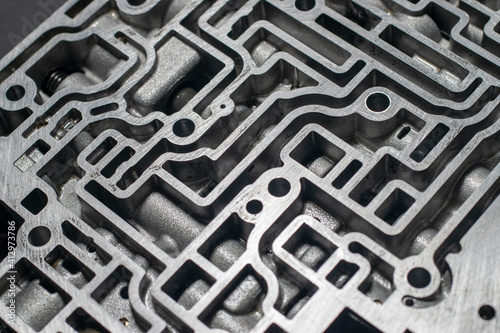 Automatic transmission control center variator gearbox valve body on black background