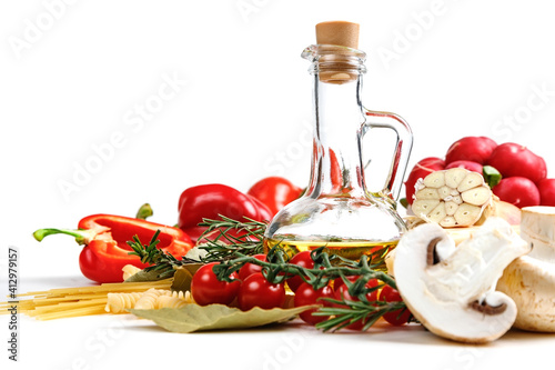 Italian food ingredients for making spaghetti pasta. Raw spaghetti with various ingredients. Isolate on a white background.