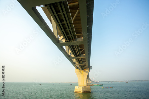 Bangladesh – February 06, 2021: A new PADMA Multipurpose Bridge is being constructed over the river Padma at Munshiganj, Dhaka, Bangladesh. photo