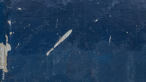 Detail of a portion of the wall painted in blue.