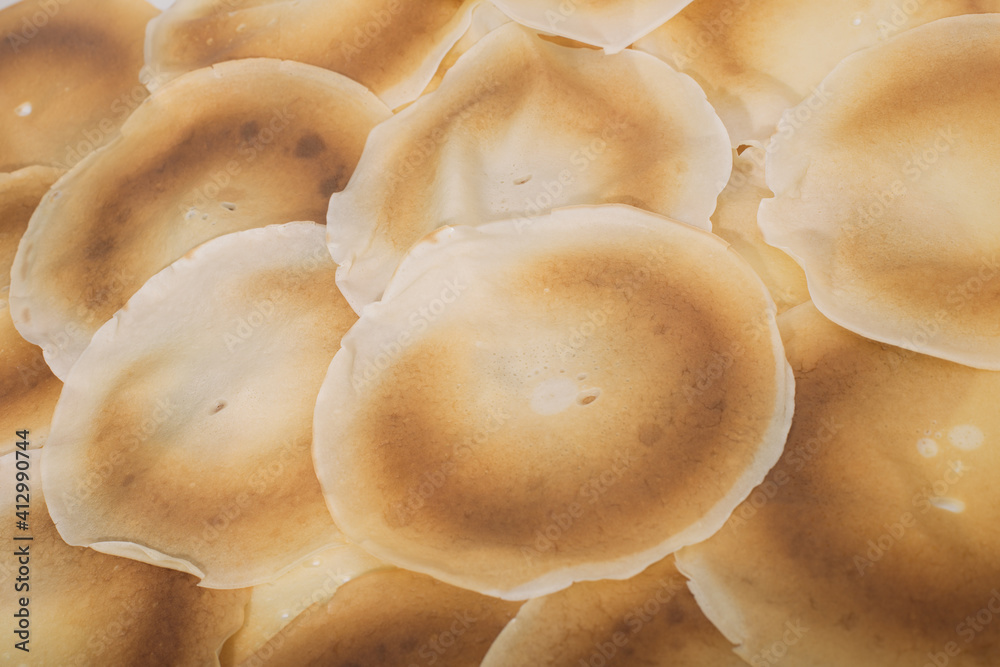dozens of pancakes as a background, copy space dozens of pancakes as a background, copy space