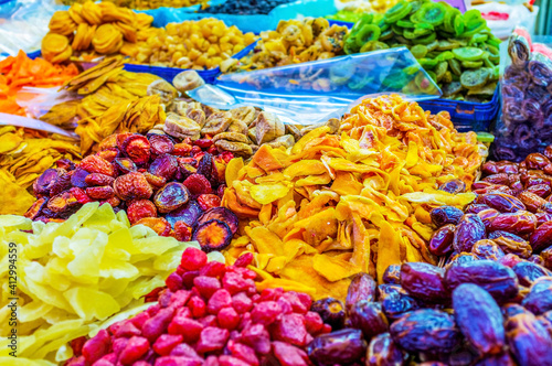 The colorful dried fruits in Carmewl market in Tel Aviv, Israel photo