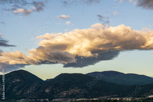 mountains in Okanagan valley and blue sky with clouds. photo
