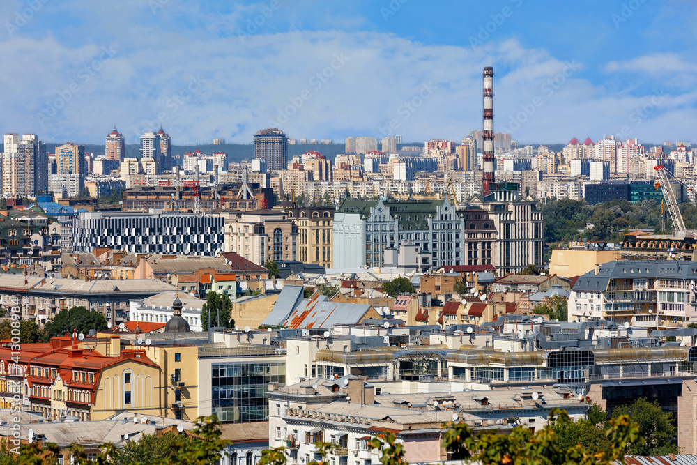 Dense development of the old district of Podil in Kyiv with residential and office buildings.