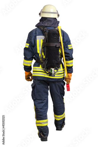 Rear view of full body walking firefighter in fire-proof uniform and hardhat with air tank on his back and axe isolated on white background isolated.