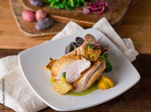 Chicken breast. Chicken pan seared to a crispy golden brown in brown butter and served with fresh organic vegetables: carrots, Brussels sprouts and green beans. Classic American restaurant favorite.
