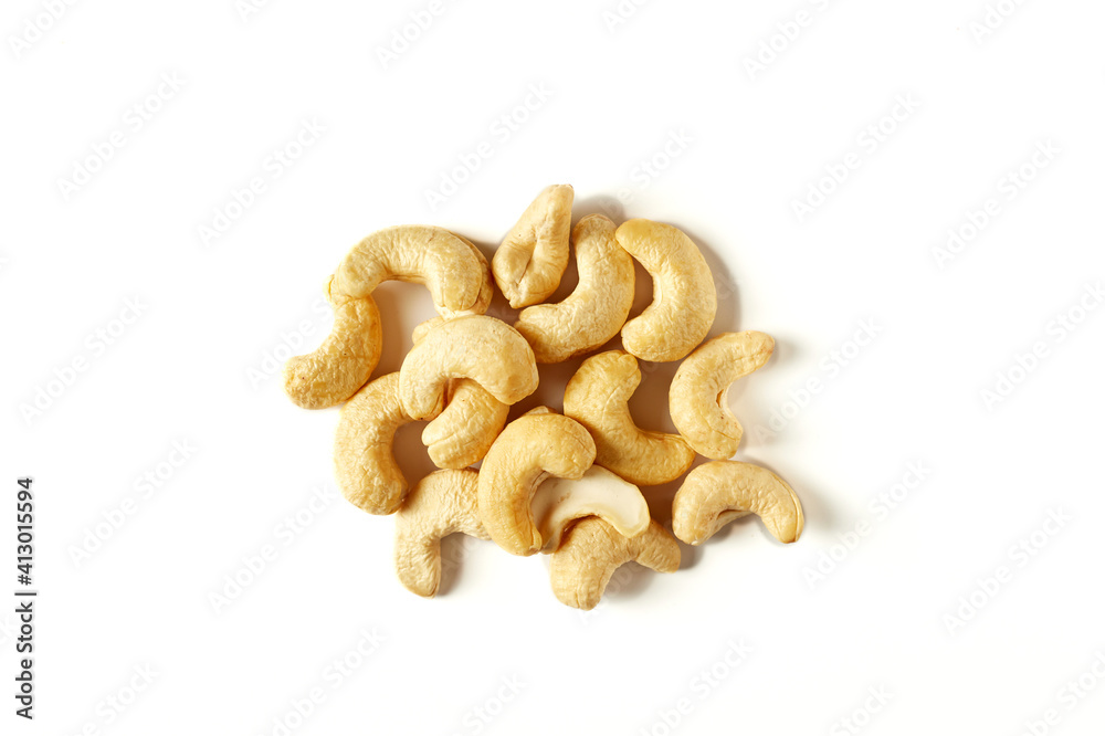 Cashews. Isolated on white background, place for text, top view. Cashews. Isolated on white background, place for text, top view.