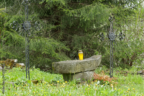 Old stone from former orthodox church in former abandoned village - Beniowa, Bieszczady Mountains photo