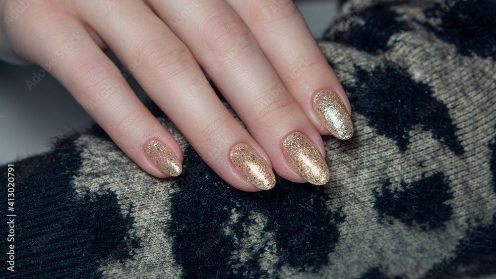 Nails Art Design. Hands With Manicure. Close Up Of Female Hands With Trendy Nails with decorations. Nails Art Design. Hands With Manicure. Close Up Of Female Hands With Trendy Nails with decorations.