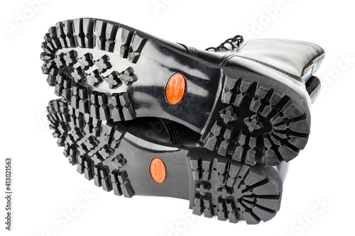 Картината върху платно close-up wide angle view of new boots mini lugs black rubber outsole with 120 pl