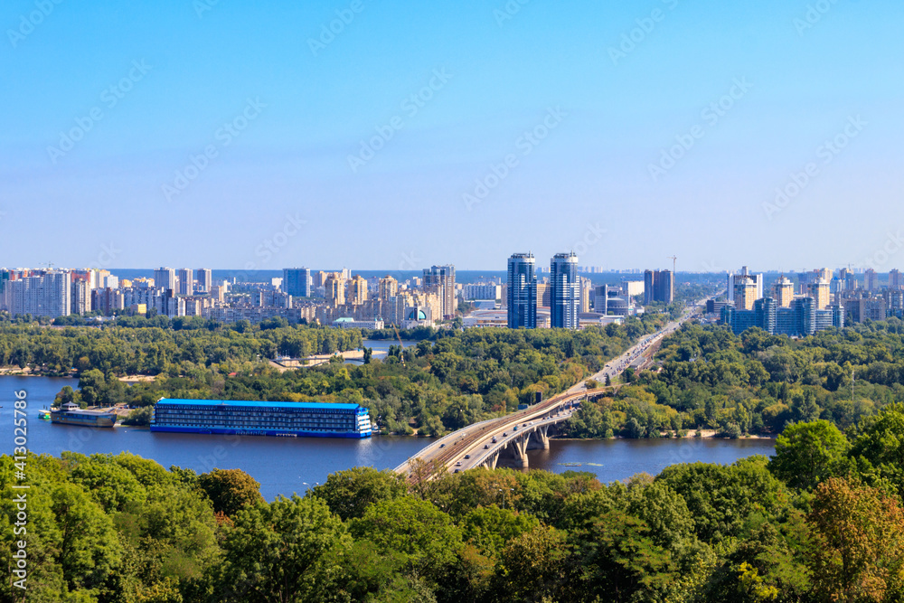 Fototapeta premium Aerial view of Metro bridge and the Dnieper river in Kiev, Ukraine. Kyiv cityscape