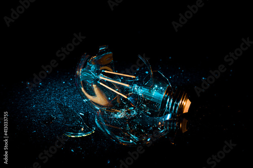 Broken bulb blue light photo